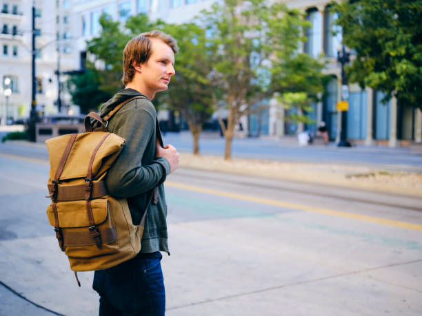 istock Millennial Man in Urban City Environment 1218816288