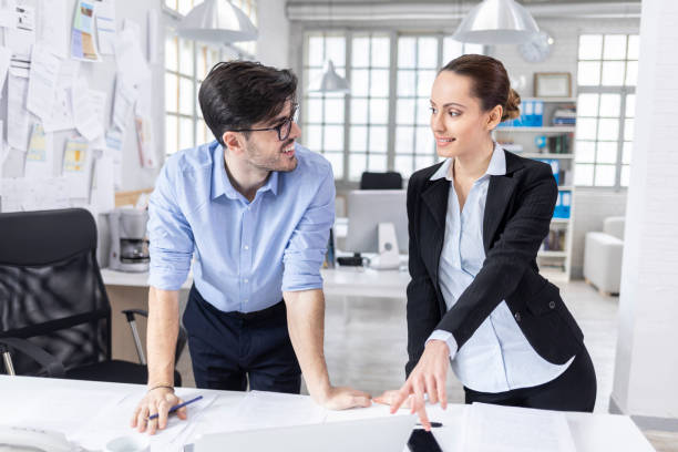 istock Businesswoman and assistant working in office 1218820369