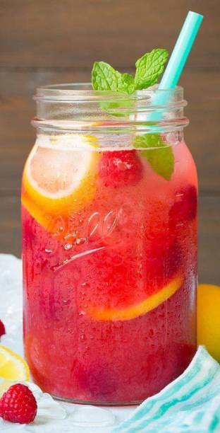 istock strawberry juice in jar with mint leaf 1218821930
