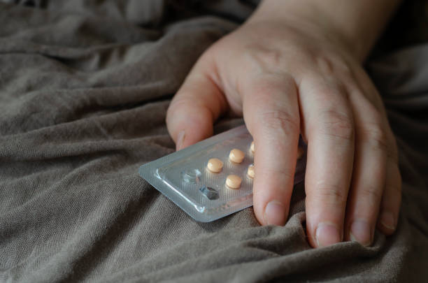 istock Blister with pills in a female hand. 1218822234