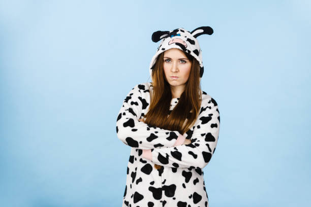 istock Woman wearing pajamas cartoon angry expression 1218826537
