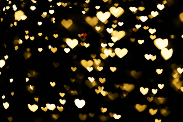istock Gold heart bokeh festive glitter overlay background 1218829092