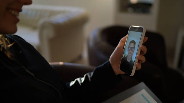 istock Young woman using smartphone for video call - calling her boyfriend 1218830225