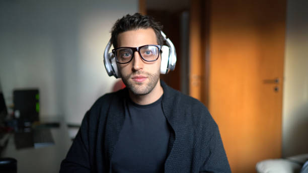 istock Young man on a video chat / online lesson at home 1218830235
