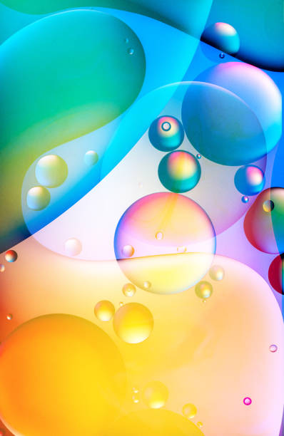 istock Abstract colourful oil drops in water 1218832026