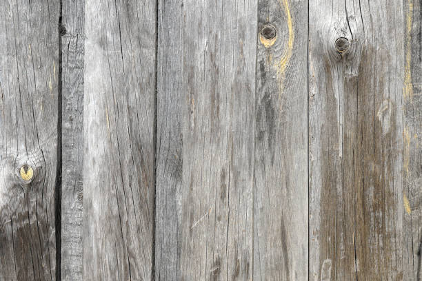 istock The background is made of old uneven poorly treated boards 1218832675