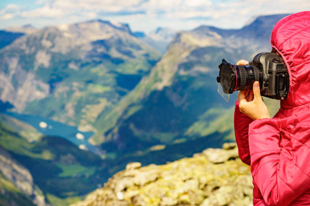 istock Tourist taking photo from Dalsnibba viewpoint Norway 1218833138
