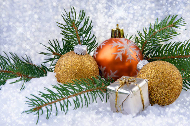 istock Festive Christmas balls, small box with present and fir branches 1218833155