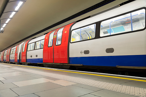 Empty subway train arrives at the station in London, England, UK.