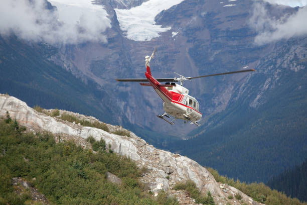 istock Helicopter Flying in Cariboo Mountains 1218835454