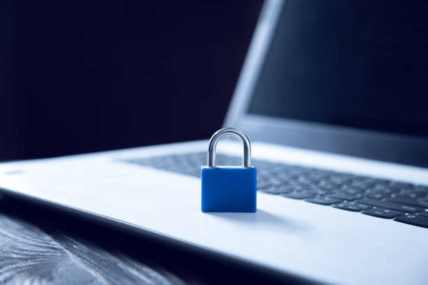istock blue lock on the laptop on the desk 1218836872