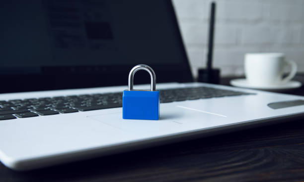 istock blue lock on the laptop on the desk 1218836880