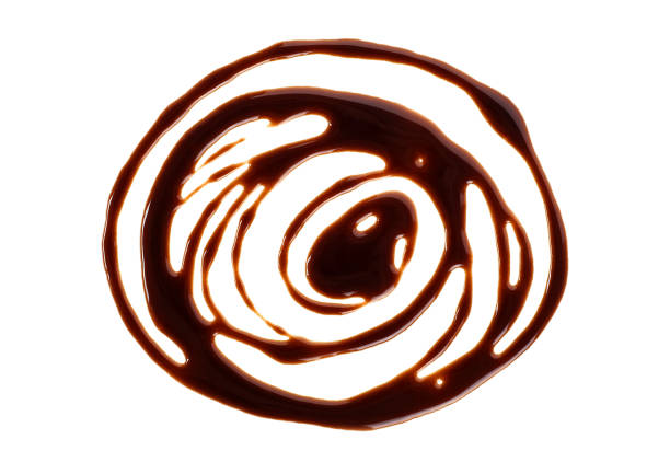 istock Chocolate syrup isolated on a white background, top view. Chocolate sauce. 1218838362