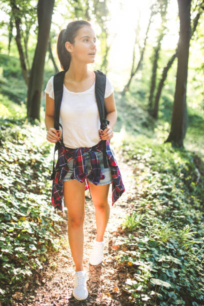 istock Woman walking on mountain 1218838794