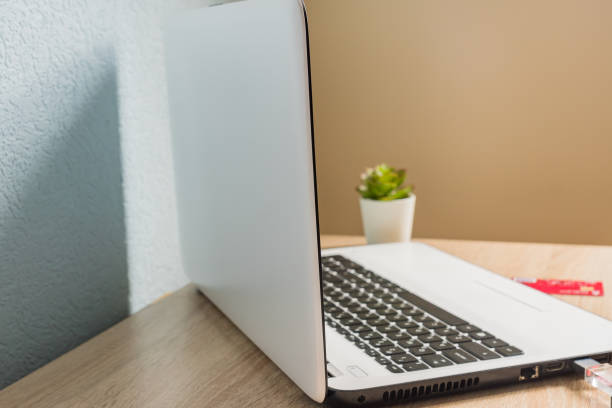 istock Home office. Open laptop on the table. 1218838815