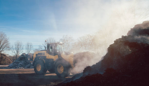 istock Bulldozer at heavy earthworks in biomass facility 1218842719