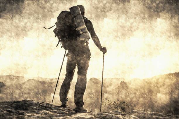 Tourist traveler man makes mountain ascent trip summer with backpack. Vacations in nature rue outdoor Calotype filter. Old photo style.