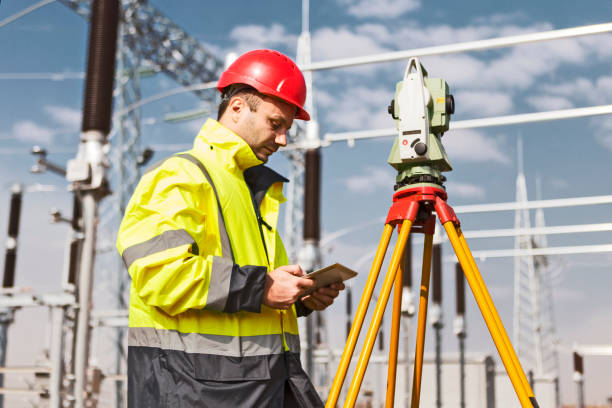 istock Engineer at electricity station looking at digital tablet 1218845695