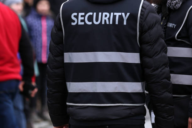 istock Male security guard at a carnival in Germany 1218847163