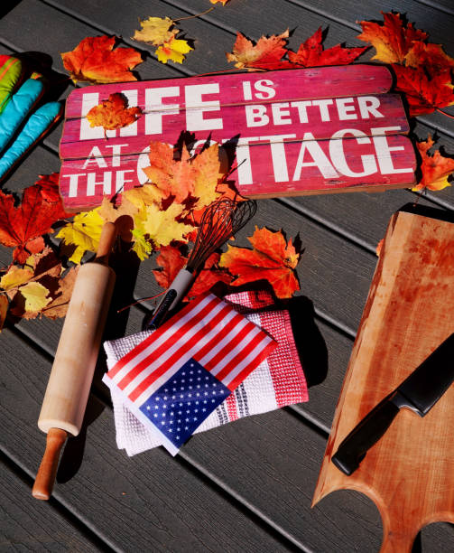 istock Autumn maple leaves with kitchen tools and food materials，American flag in the middle 1218848034