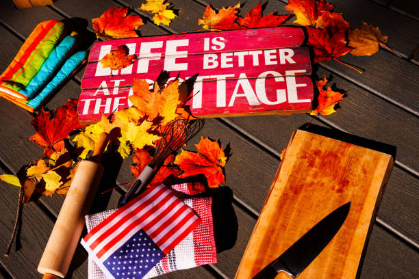 Autumn maple leaves with kitchen tools and food materials，American flag in the middle