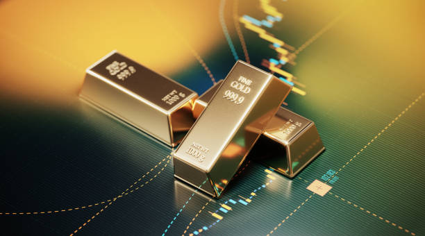 Gold Bars Sitting over A Bar Graph - Stock Market and Finance Concept Gold bars sitting over a bar graph. Selective focus. Horizontal composition with copy space. Stock market and finance concept. ingot photos stock pictures, royalty-free photos & images