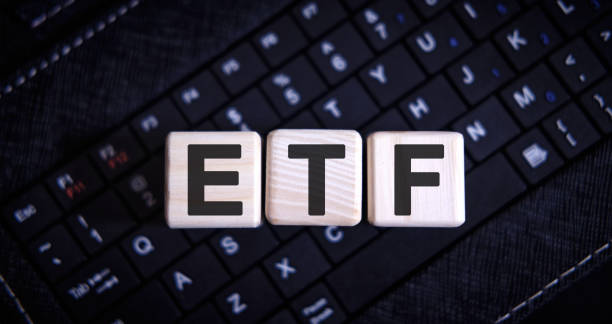 istock ETF word concept on cubes on the keyboard 1218850334