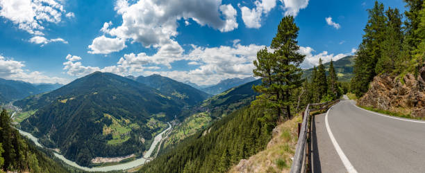 European alpine landscape with mountain road stock photo