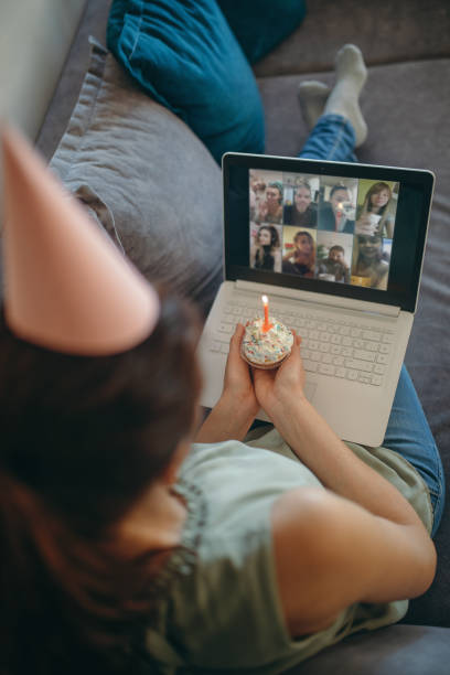 istock Woman celebrating birthday alone at home 1218851678