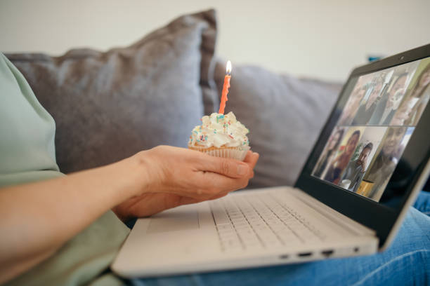 istock Woman celebrating birthday alone at home 1218851688