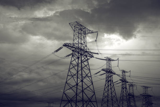 istock high-voltage  power lines at storm clouds. electricity distribution station. high voltage electric transmission tower. 1218857829