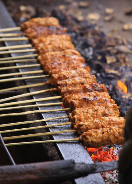 istock Bali sate sticks ready to be grilled in Indonesia 1218860384