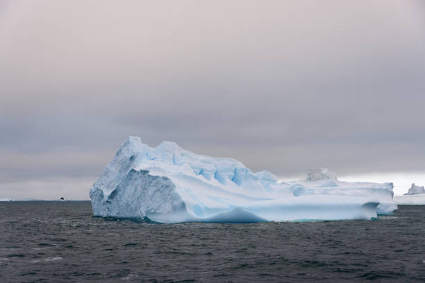 istock Iceberg in Antarctic sea 1218860909