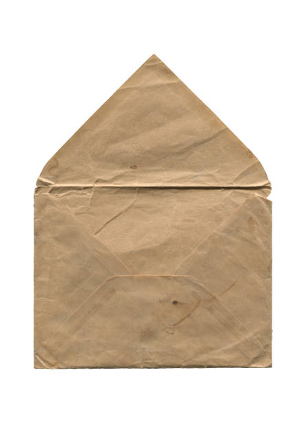 front view closeup of blank brown old aged open letter paper envelope with torn edges and antique stained texture isolated on white background