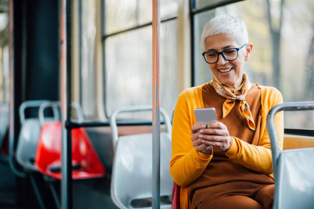 istock Senior woman typing a message 1218865577