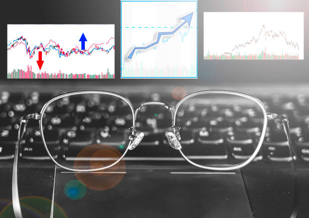 istock Index growth chart with laptop and glasses;  business concept 1218866452