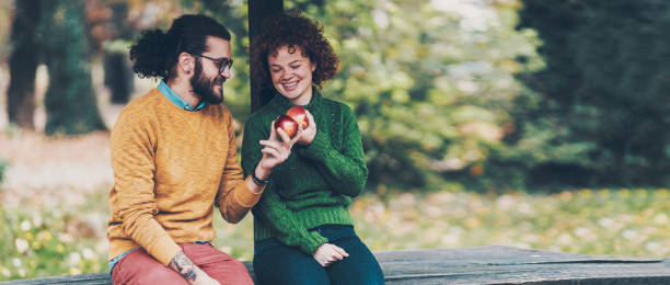 istock Loving young couple having fun outdoors 1218866886