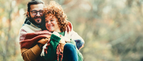 istock Loving young couple having fun outdoors 1218867059