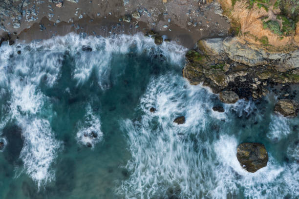 istock Waves Break on Rugged California Coastline Aerial 1218867145