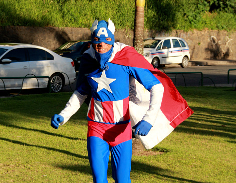 salvador, bahia / brazil - august 26, 2012: man is seen wearing a Captain America costume on the street in the city of Salvador.