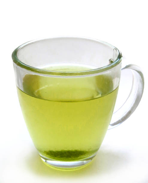 istock Glass mug with green tea 1218883705