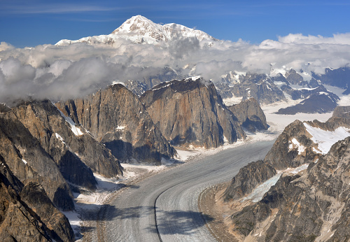 Mount Denali (formerly Mount McKinley) towering above the Great Gorge of the Ruth Glacier, Denali National Park, Alaska, USA. Mount Denali is the highest peak in North America with an elevation of 20,310 feet (6,190 m) above sea level.