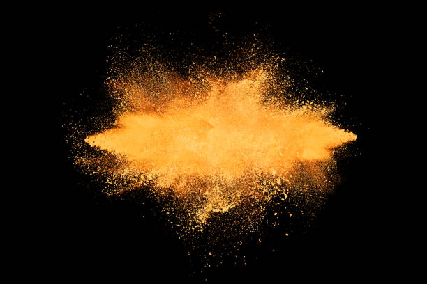 istock Abstract design of orange powder cloud 1218886432