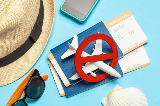 No vacation. Closed visa. Spoiled summer vacation No vacation. Closed visa. Spoiled summer vacation. Ban on flight, quarantine. Passports and plane tickets are crossed out cancellation photos stock pictures, royalty-free photos & images