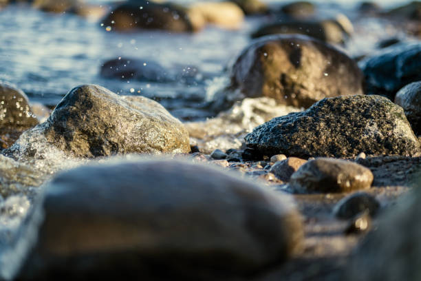 istock waves crushing on the rocks on beach 1218893557