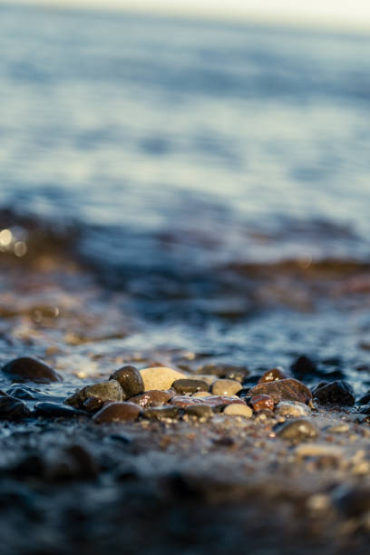 istock waves crushing on the rocks on beach 1218893570