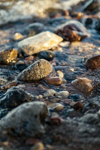 istock waves crushing on the rocks on beach 1218893576