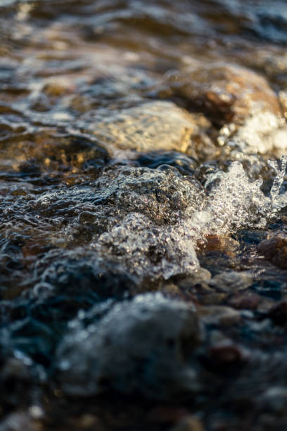 istock waves crushing on the rocks on beach 1218893580
