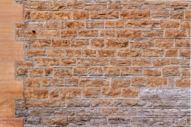 19th century limestone block wall texture with beaded mortar