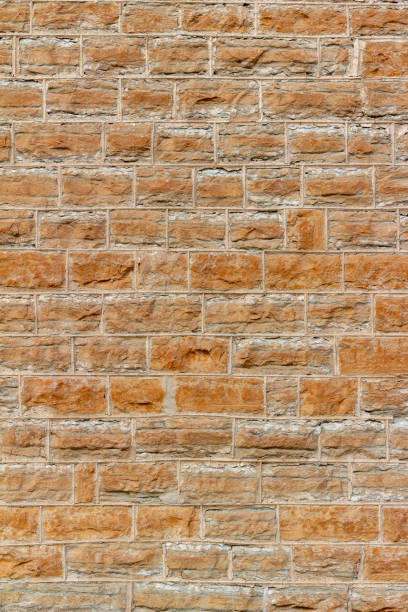 19th century limestone block wall texture with beaded mortar